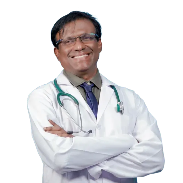 Dr. Dante Ruskin consulting a patient at PPK Hospital, Marthandam